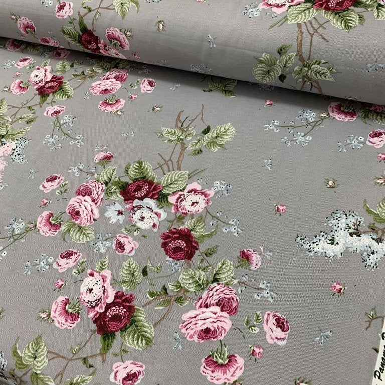 Stone grey upholstery and curtain fabric with pink and burgundy roses and sage green leaves print.