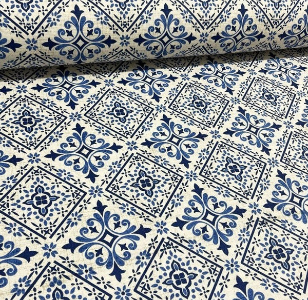 Blue, navy and white tile patterned cotton canvas fabric with geometric shapes and ornaments.