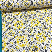 Portuguese mosaic floral tile fabric in yellow, dark grey and white.
