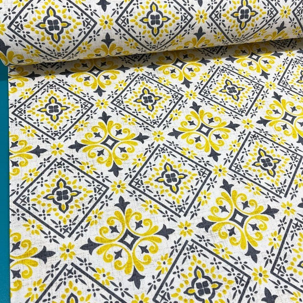Portuguese mosaic floral tile fabric in yellow, dark grey and white.