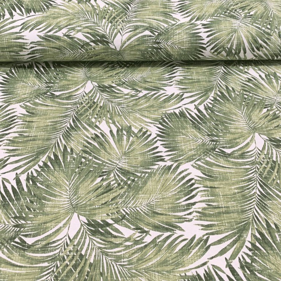 Green palm leaves fabric for upholstery and curtain projects.