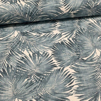 Indigo blue palm leaves fabric for upholstery and curtain projects.